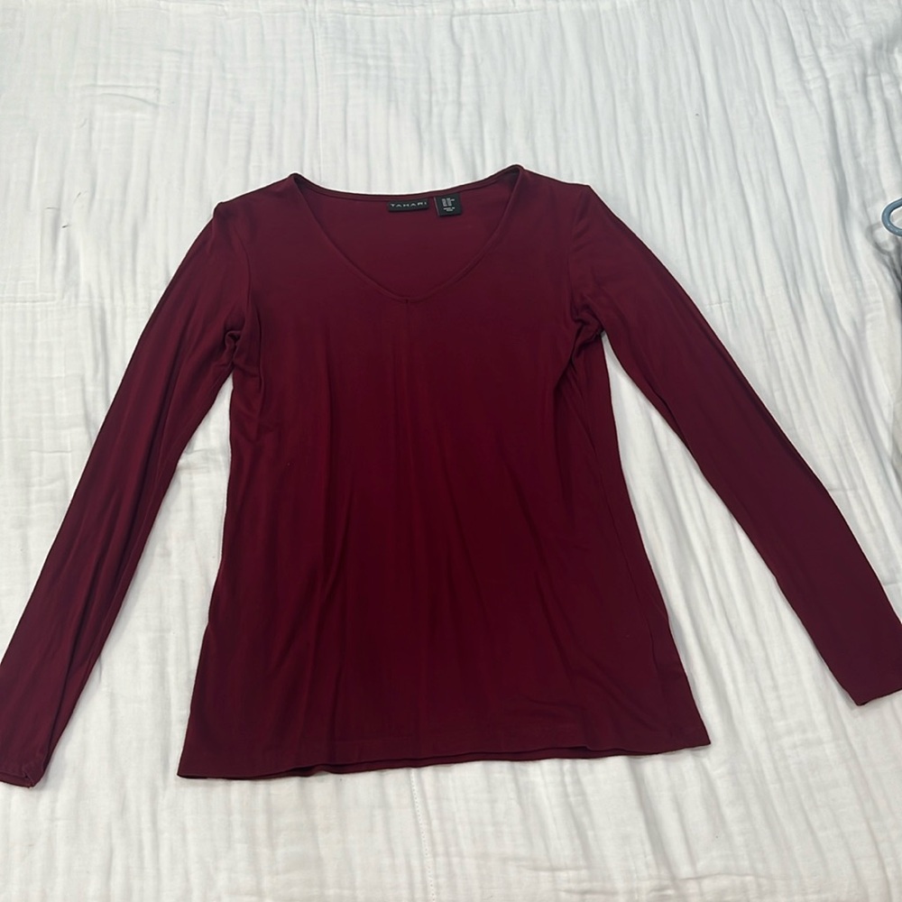 Long sleeve red top.